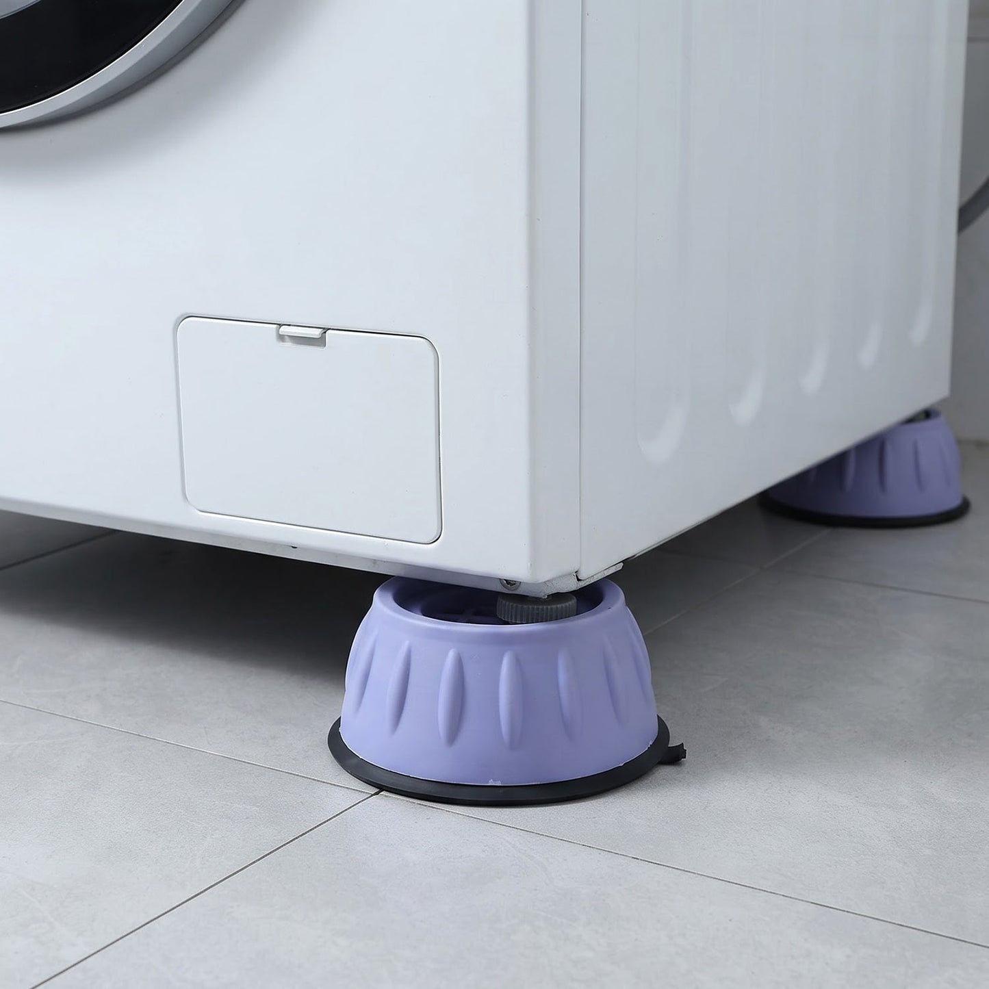 Pads reducing shaking and noise during a spin cycle