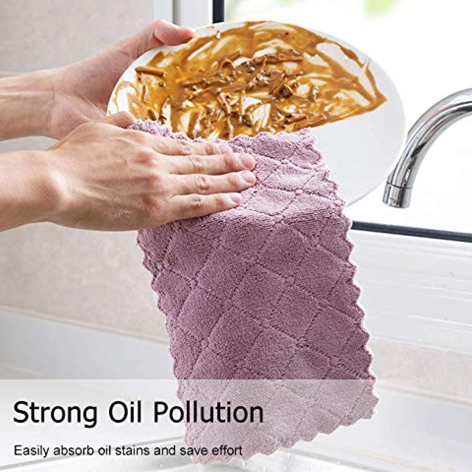 A hand uses a purple microfiber towel with a textured pattern to wipe a white plate covered in food residue.