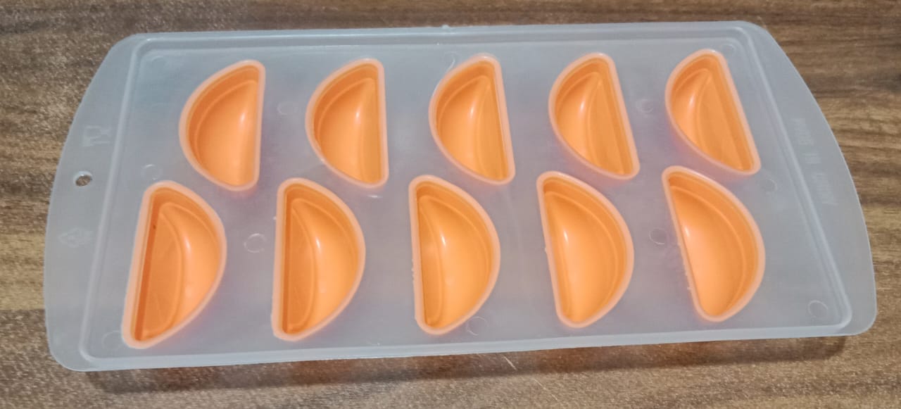 Silicone fruit ice tray displayed in a modern kitchen.
