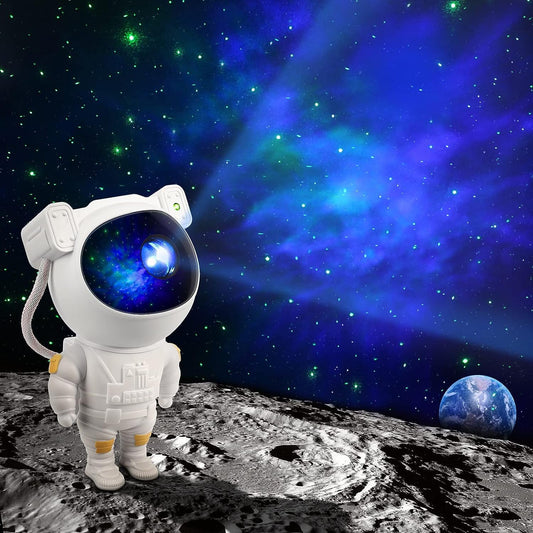 A white astronaut projector stands on a moon surface, projecting a blue and green galaxy onto a dark sky with Earth in the