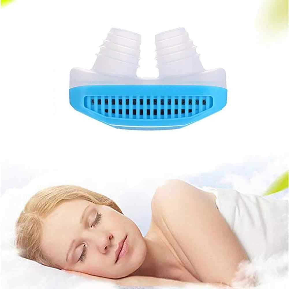 A blue and white anti-snoring nose clip above a sleeping woman on a white pillow.
