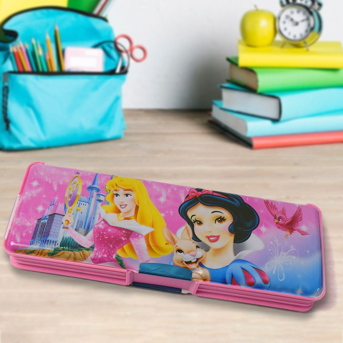Pink pencil case with Disney princesses Snow White and Aurora, with school supplies in the background.