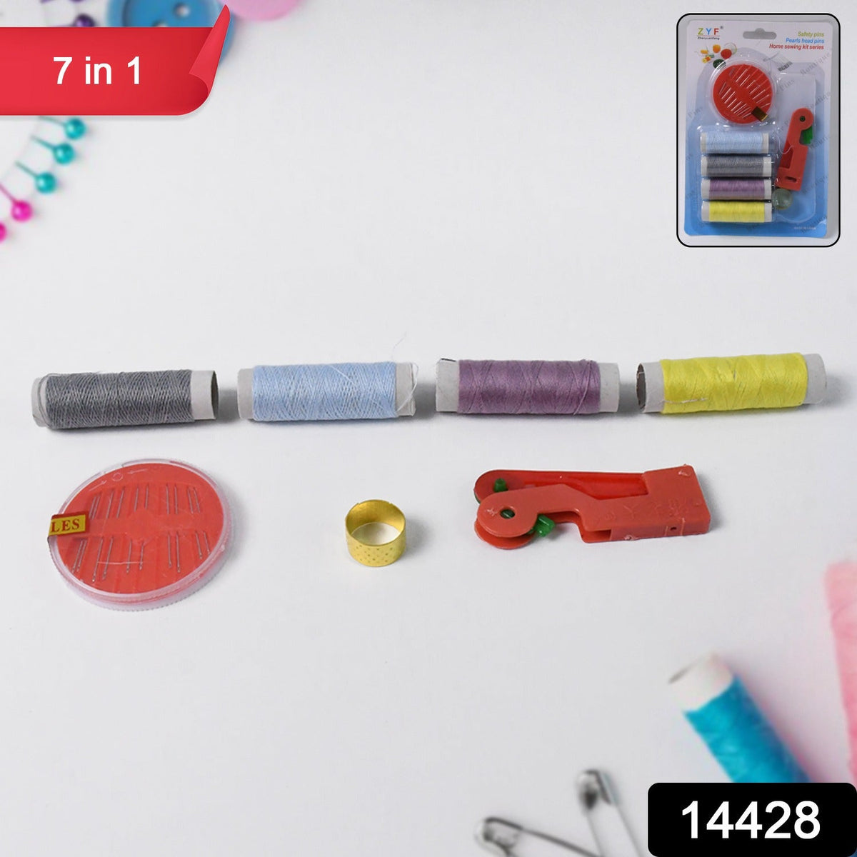 A 7-in-1 sewing kit with four spools of thread, a needle disc, thimble, and needle threader on a white surface.