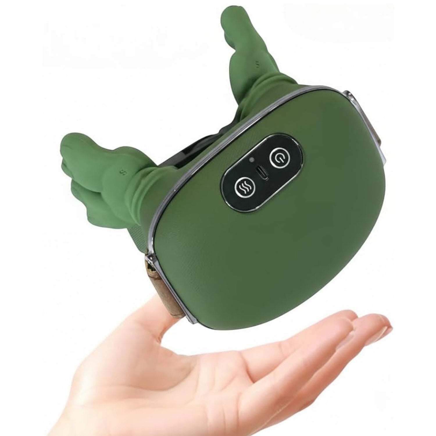 A hand holds a green bionic massager with a brown strap, showing the control panel with power and heat buttons. The massager