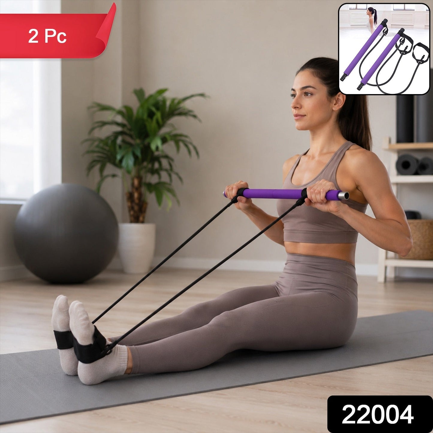 Person demonstrating yoga stretches using the resistance band exercise bar.