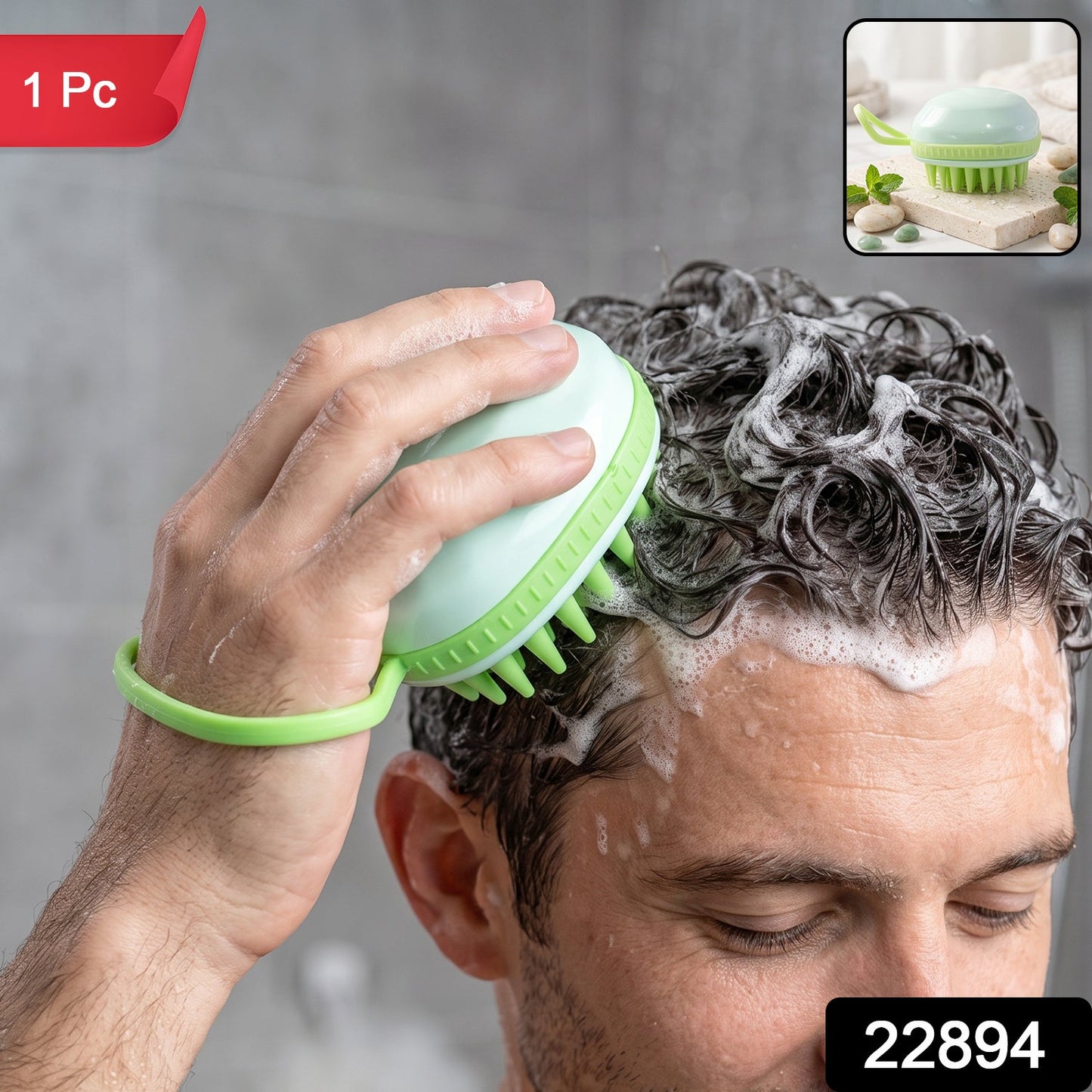 A man shampoos his hair with a light green silicone scalp massage brush, creating white suds, with a small inset showing the