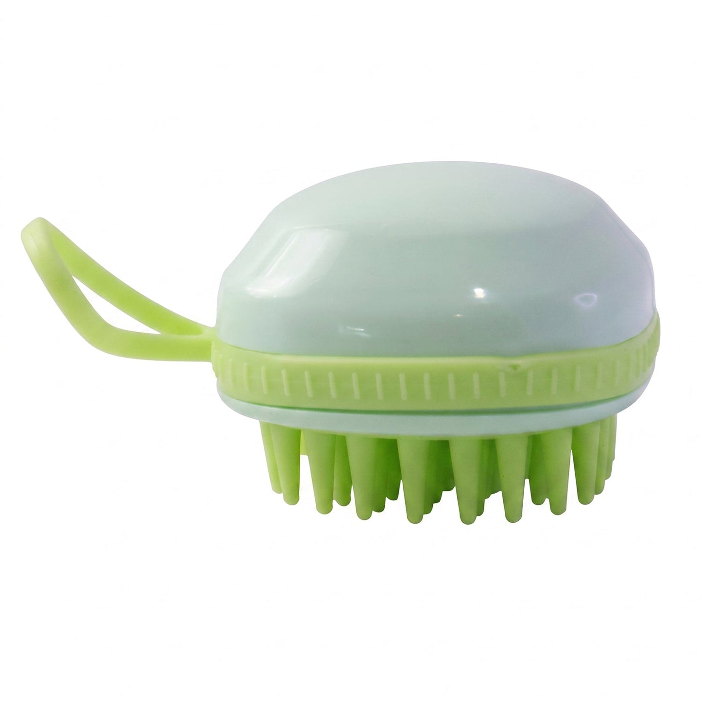 The light green silicone scalp massage brush, featuring a handle and soft bristles, is presented against a plain white