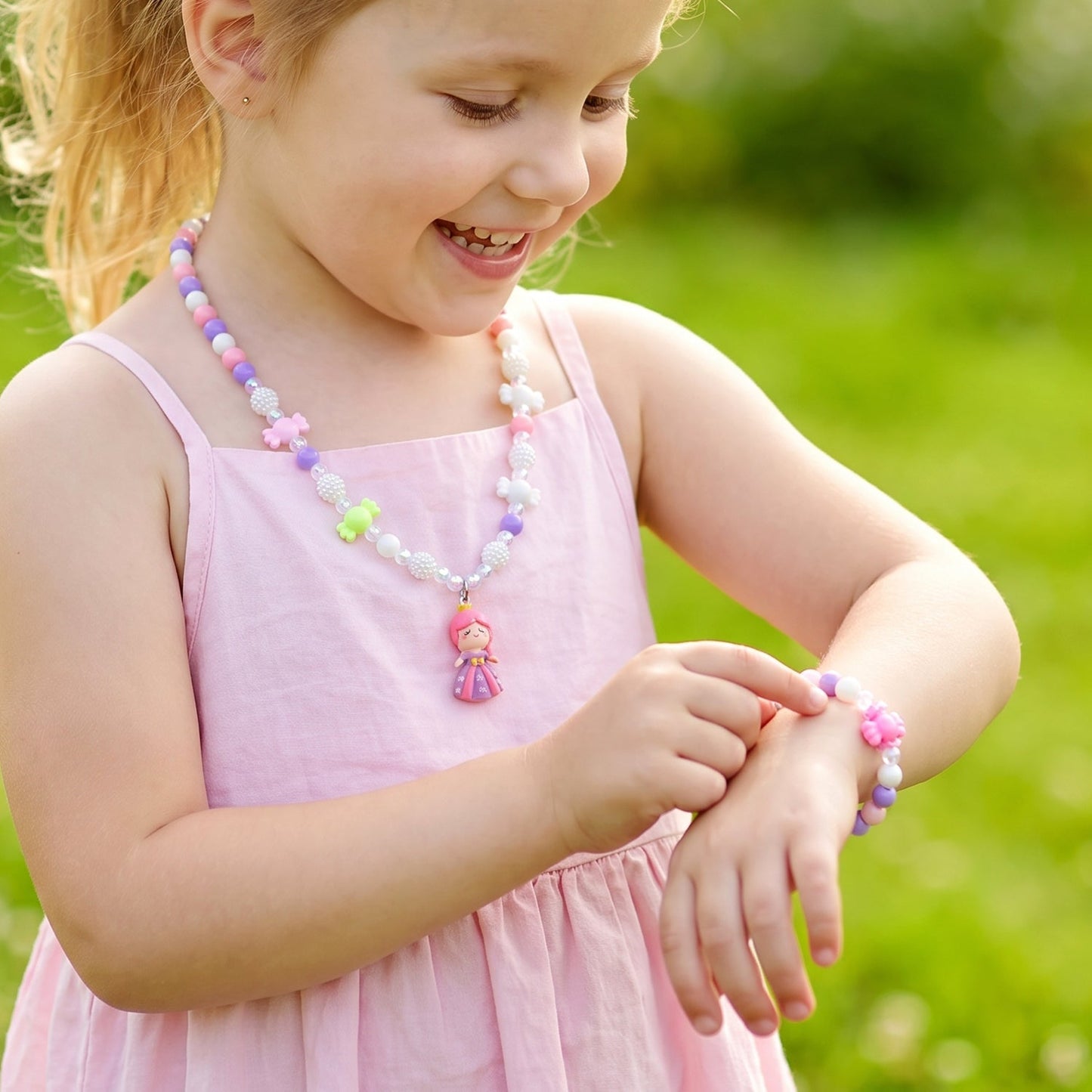 Kids bead necklace and bracelet set in use