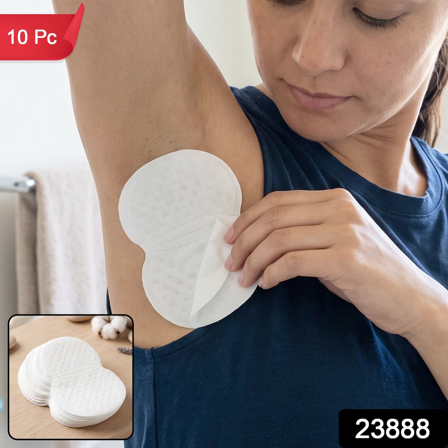 Woman applying a disposable underarm sweat pad, with additional pads shown beside her.