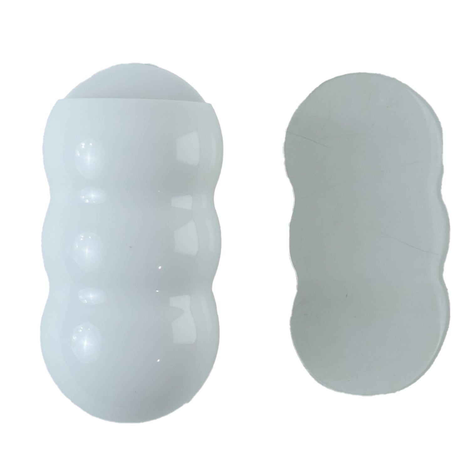 White, caterpillar-shaped holder and a clear adhesive strip on a white background.