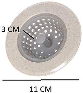 A beige and gray round silicone sink strainer with measurements indicating 3 cm depth and 11 cm diameter.
