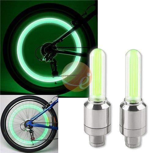 Two green LED valve cap lights next to two images of a bicycle wheel with green glowing lights.