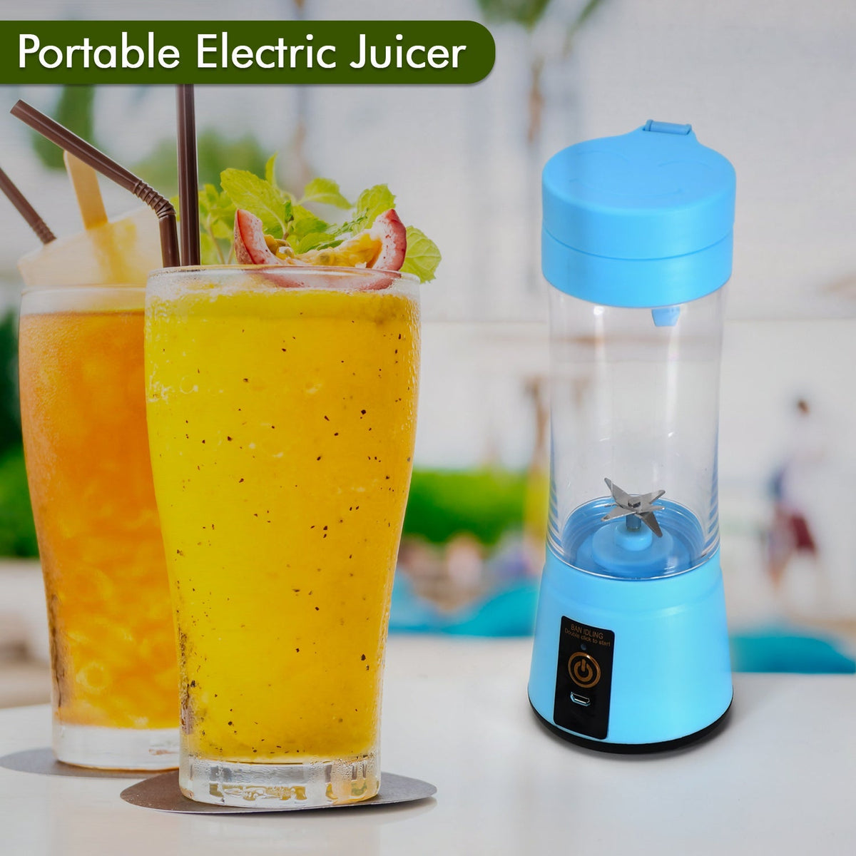 A blue portable juicer blender stands next to two tall glasses of yellow smoothies with straws on a white table.