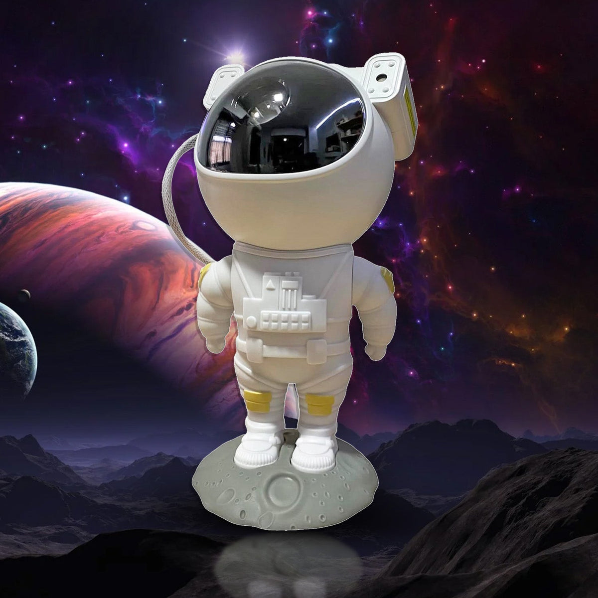 A white astronaut projector stands on a moon-like surface, with a large red and purple planet and smaller moons in the