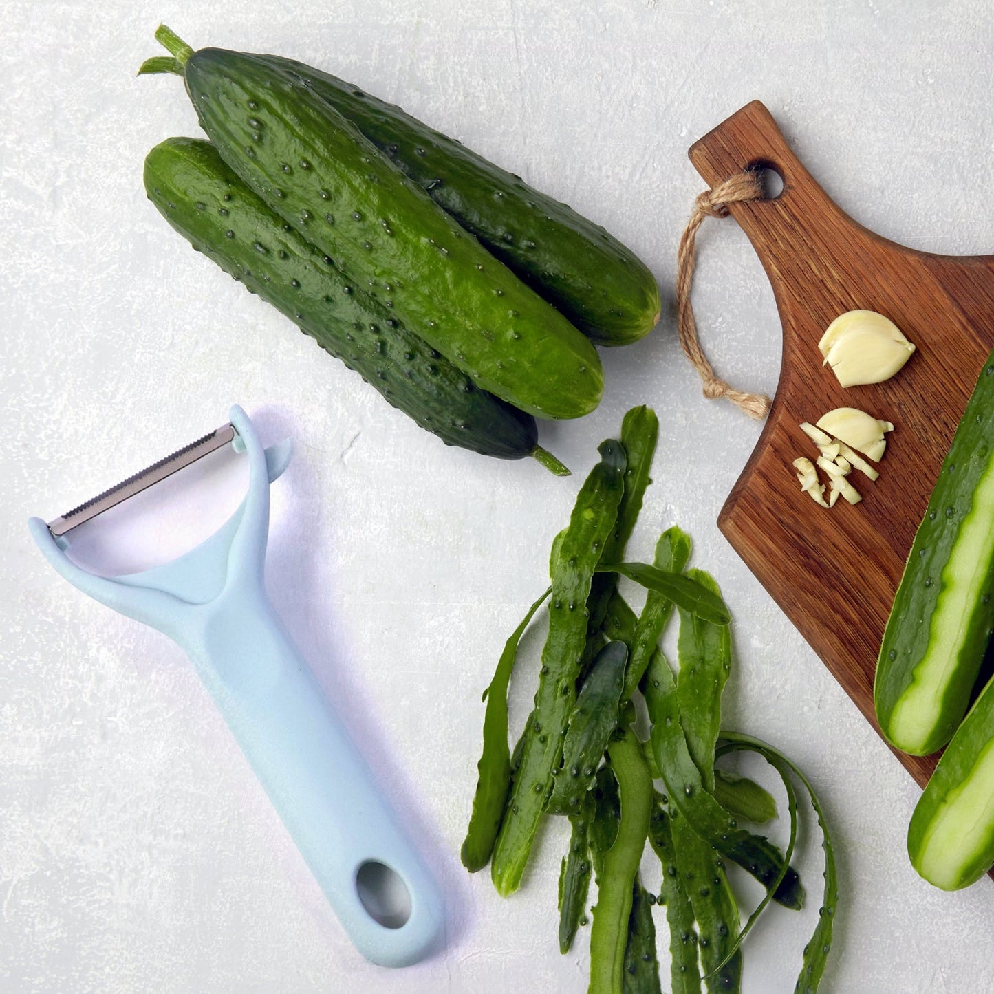 Multipurpose kitchen cutting board set with knife and peeler