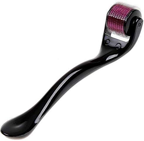 A black derma roller with a purple head and visible needles is angled on a white background.
