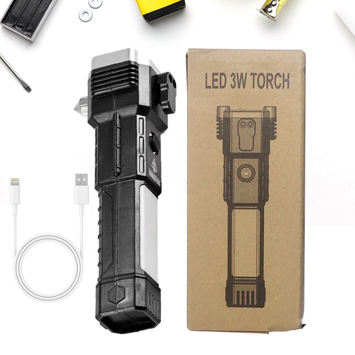 Black and silver multi-tool flashlight with a white USB charging cable and its brown cardboard box.