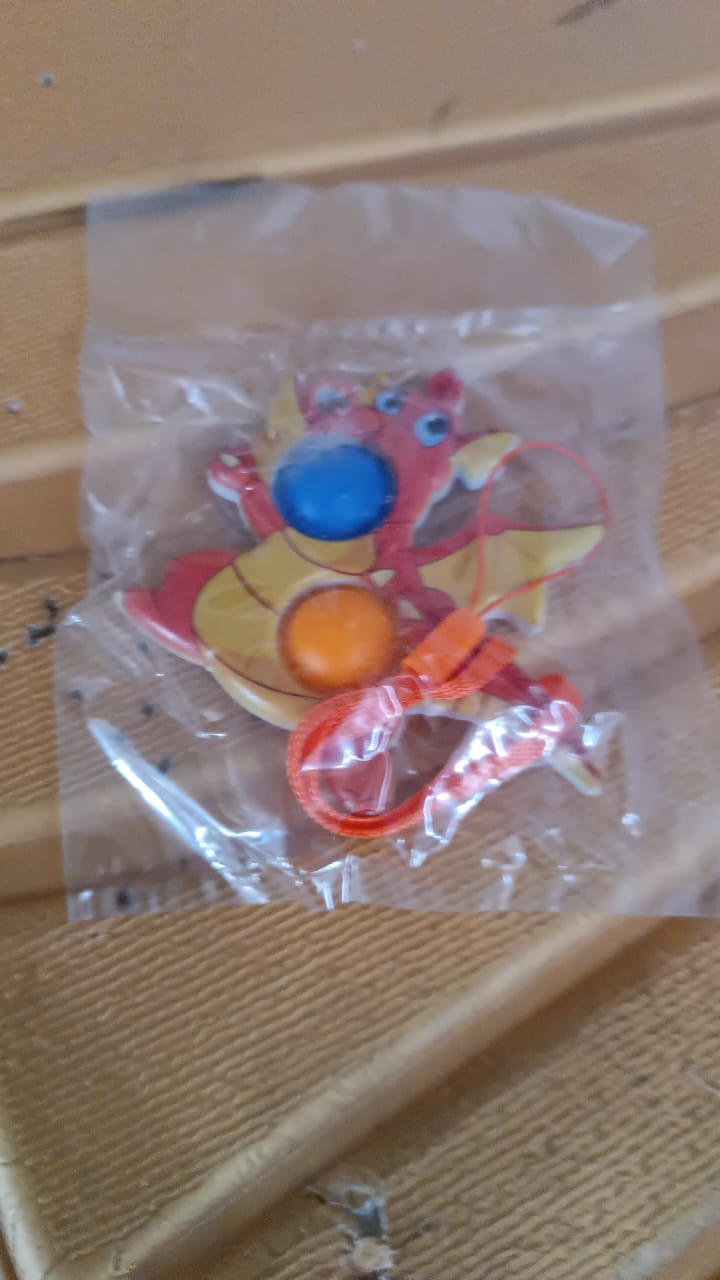 Close-up of dragon fidget toy face bubble for sensory stress relief