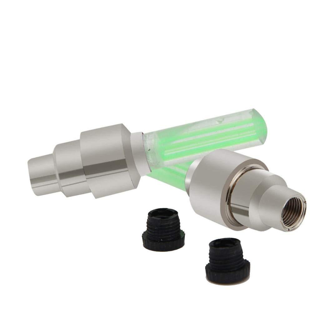 Two green LED valve cap lights with black adapters, displayed on a plain white background.