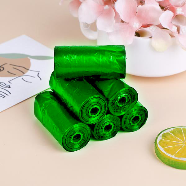 Biodegradable green corn starch trash bags designed for eco-conscious waste management.