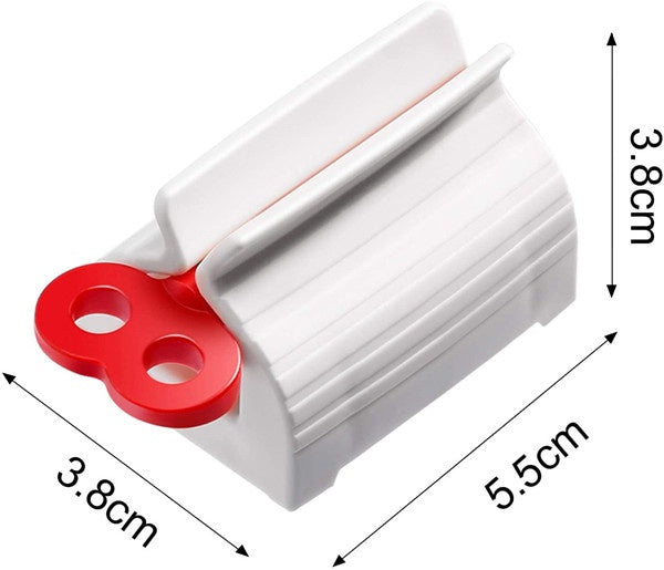 A white plastic tube squeezer with a red winding key, displaying dimensions of 3.8cm, 3.8cm, and 5.5cm.