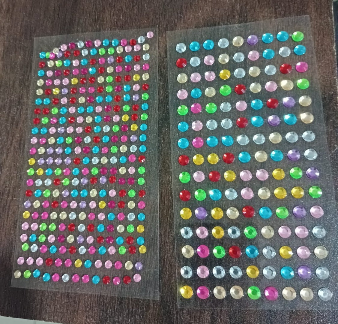 Brightly shimmering self-adhesive decorative shining stone stickers on display.