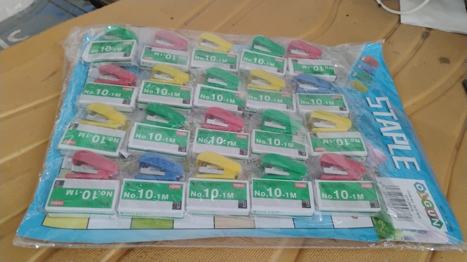 Mini stapler set with colorful staplers and staple boxes