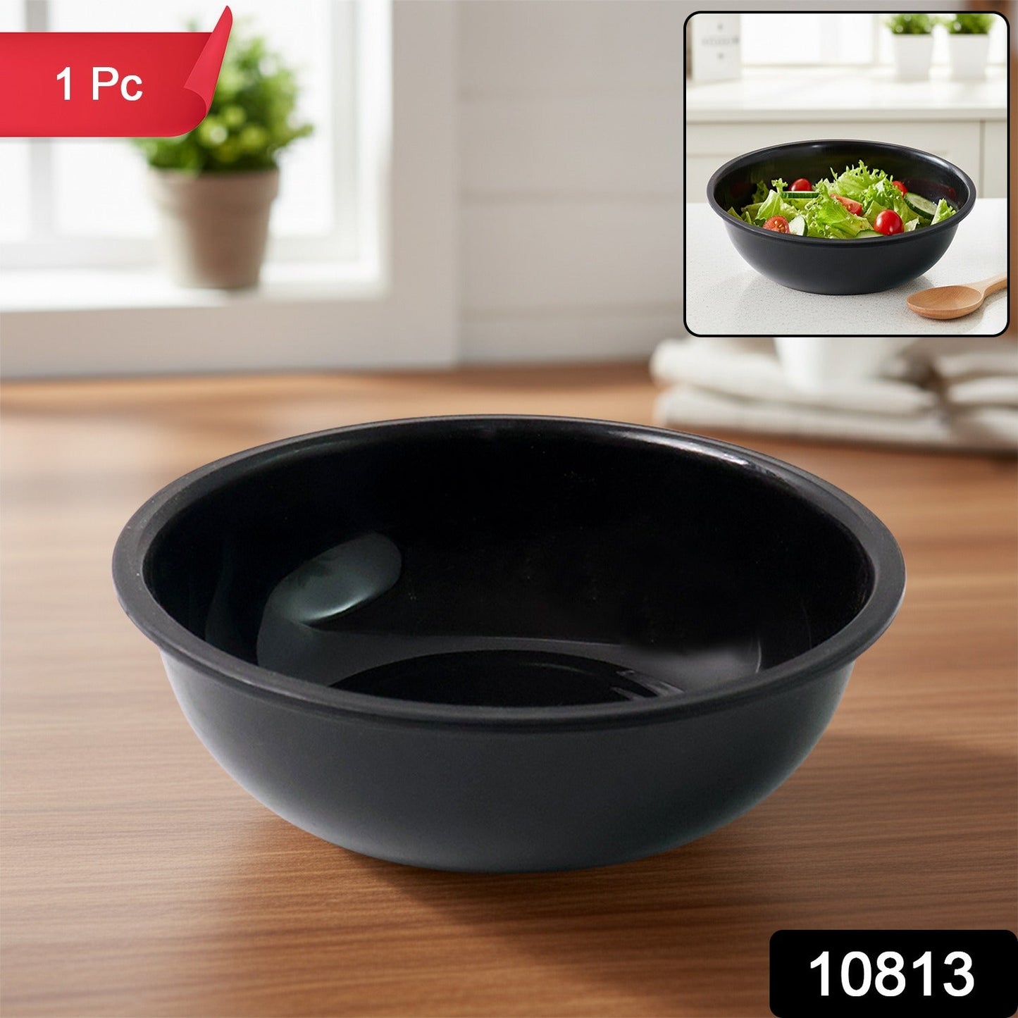 Black plastic serving bowl filled with curry showing deep design