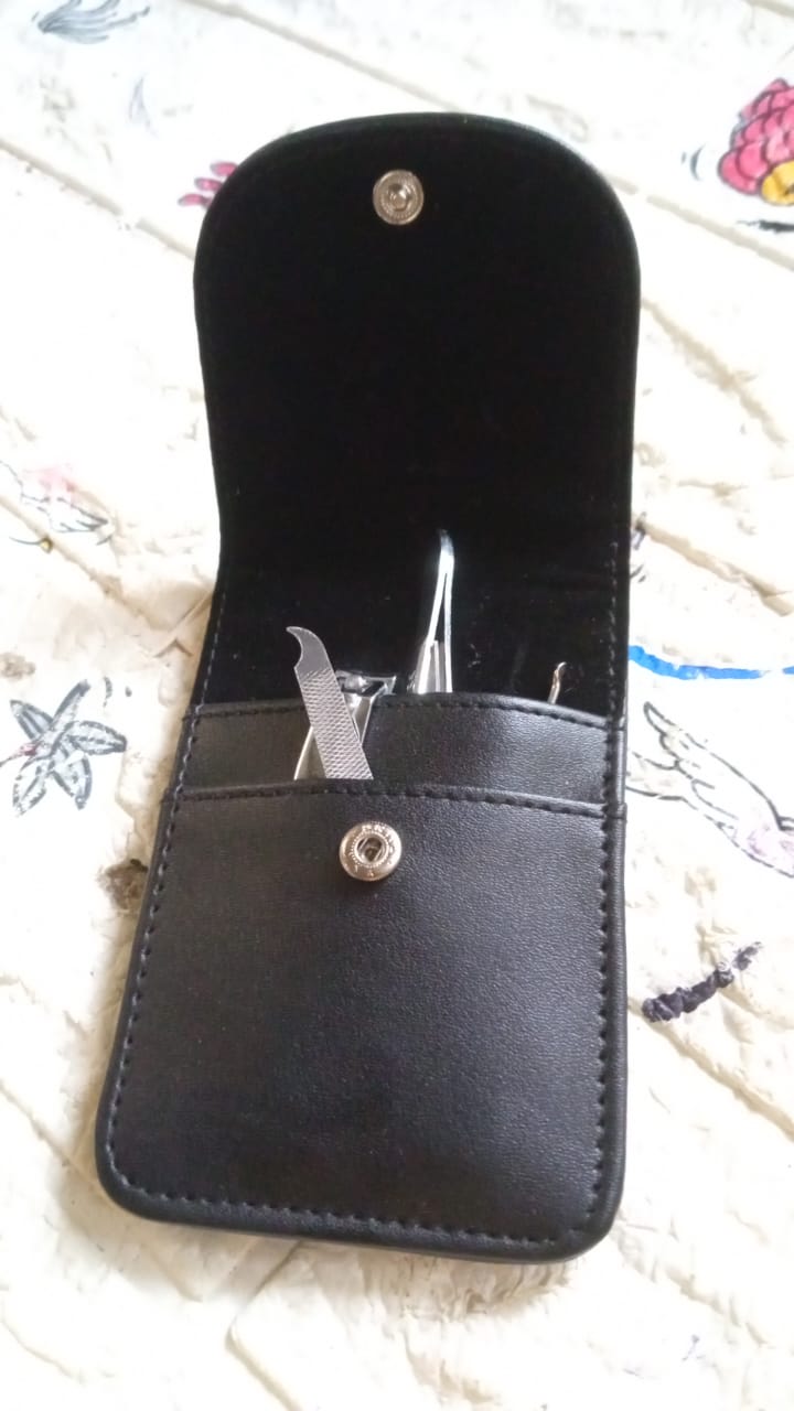 A full display of the professional 6-in-1 stainless steel manicure set's multiple high-quality tools.
