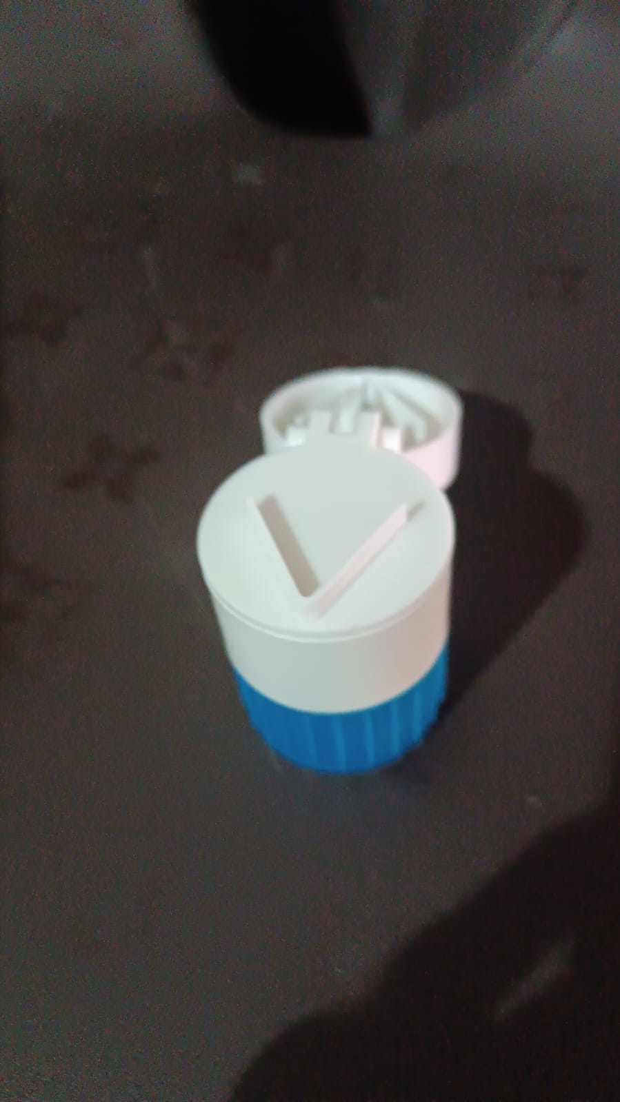 Front view of the Organivo 4-in-1 portable pill cutter, crusher, and storage box.