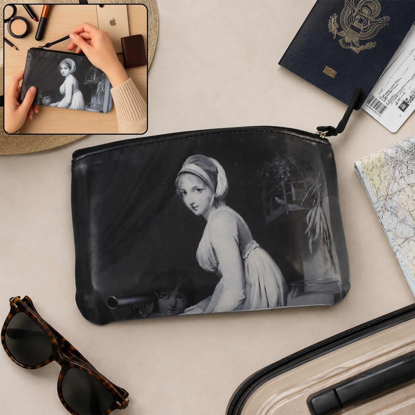 A black and white travel pouch featuring a classic painting of a woman, surrounded by travel essentials.
