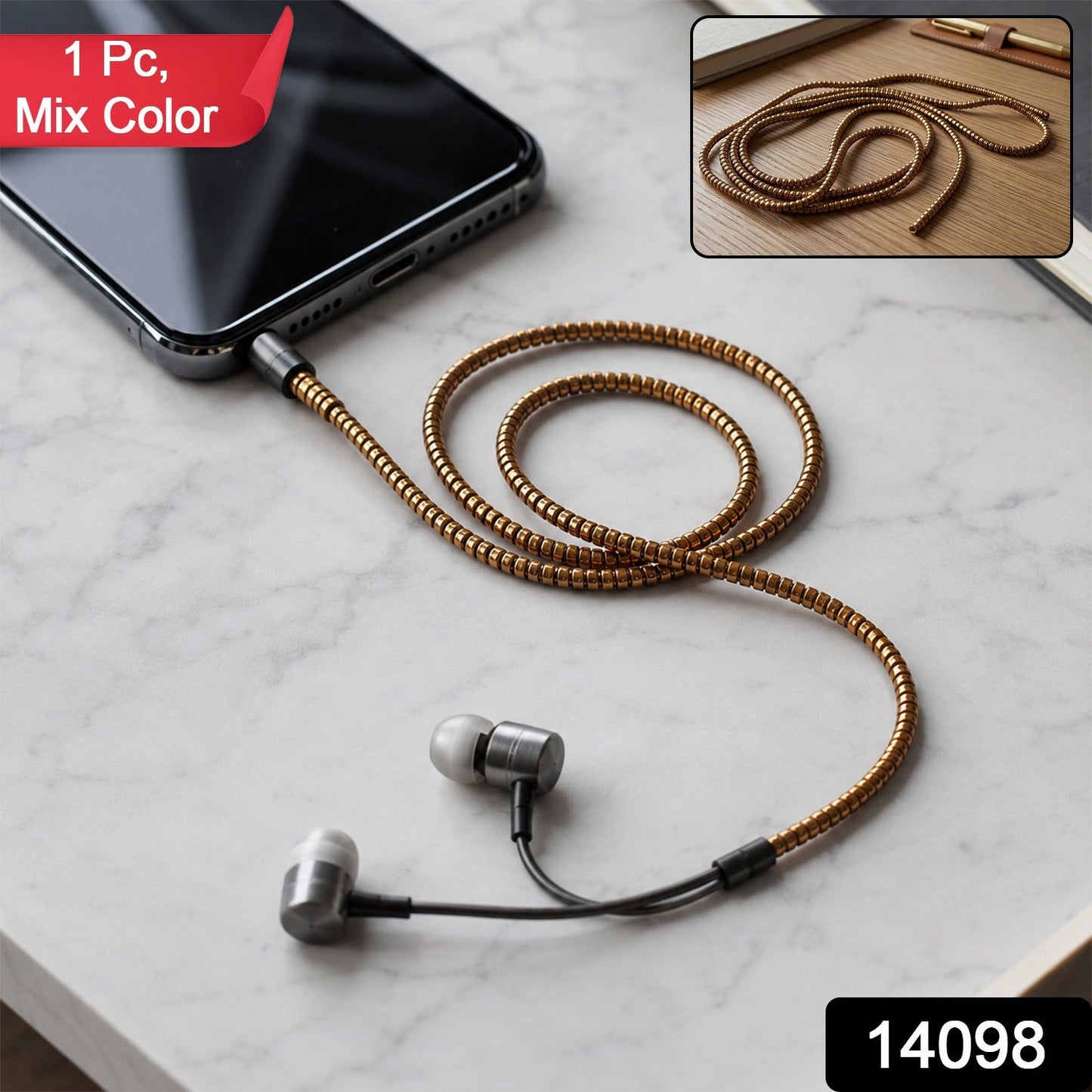 A black phone and silver earphones connected by a gold spiral cable protector sleeve on a white marble surface.