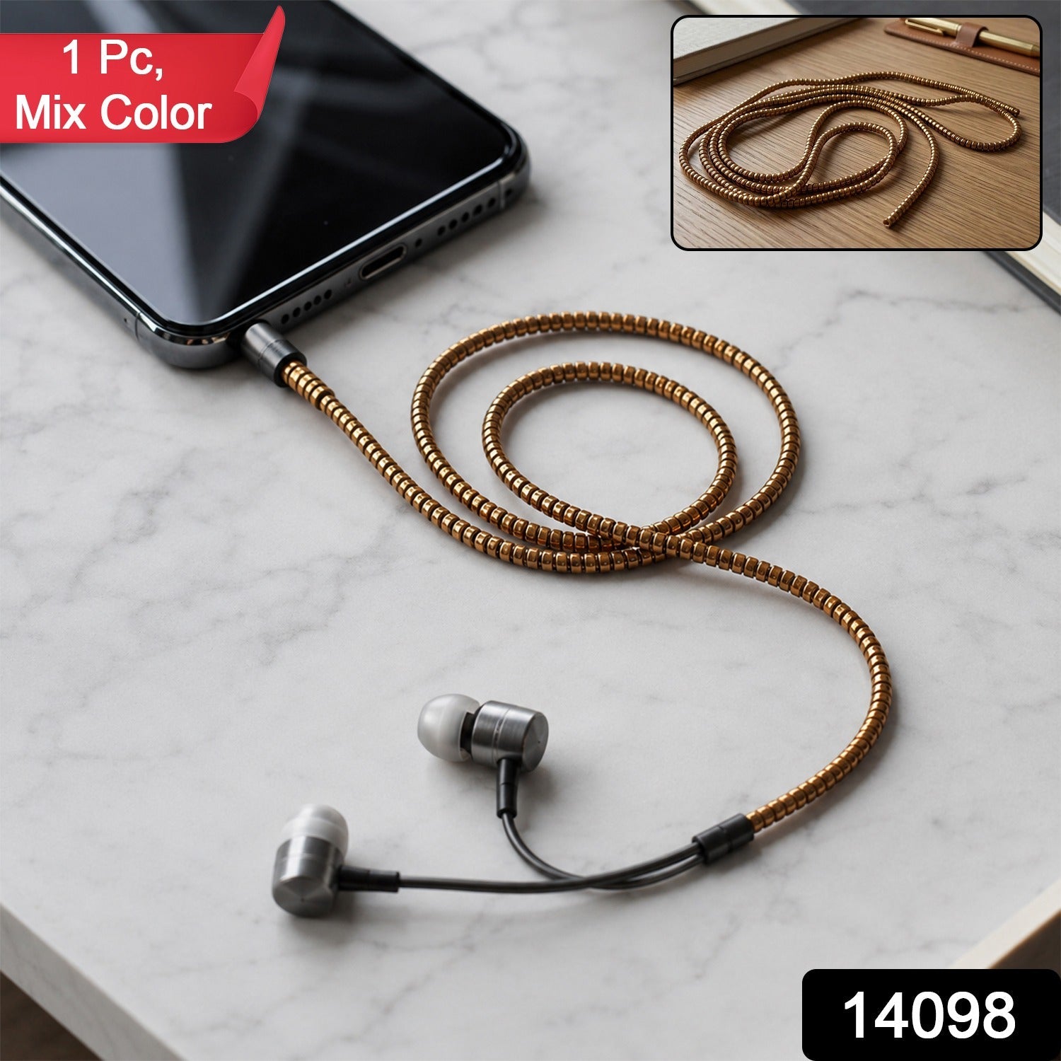 A black phone and silver earphones connected by a gold spiral cable protector sleeve on a white marble surface.