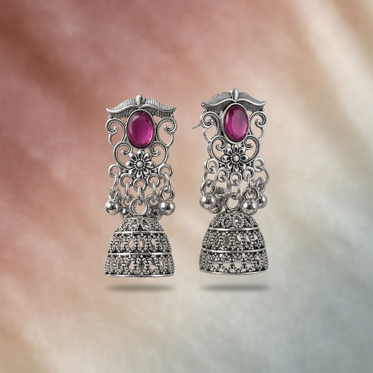 German Silver Jhumka Earrings with Red Monalisa Stones