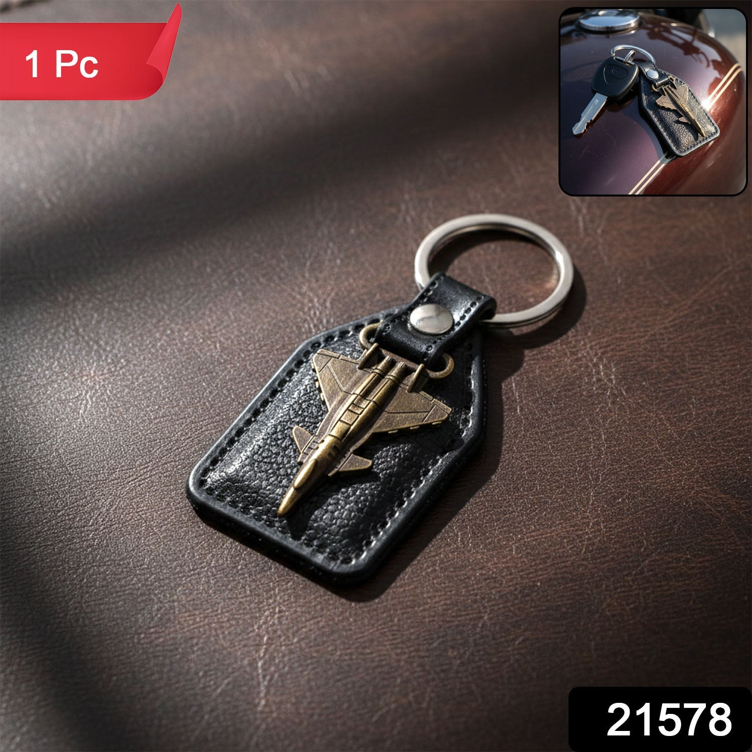 Leather finish keychain featuring metal aircraft emblem and sturdy key ring