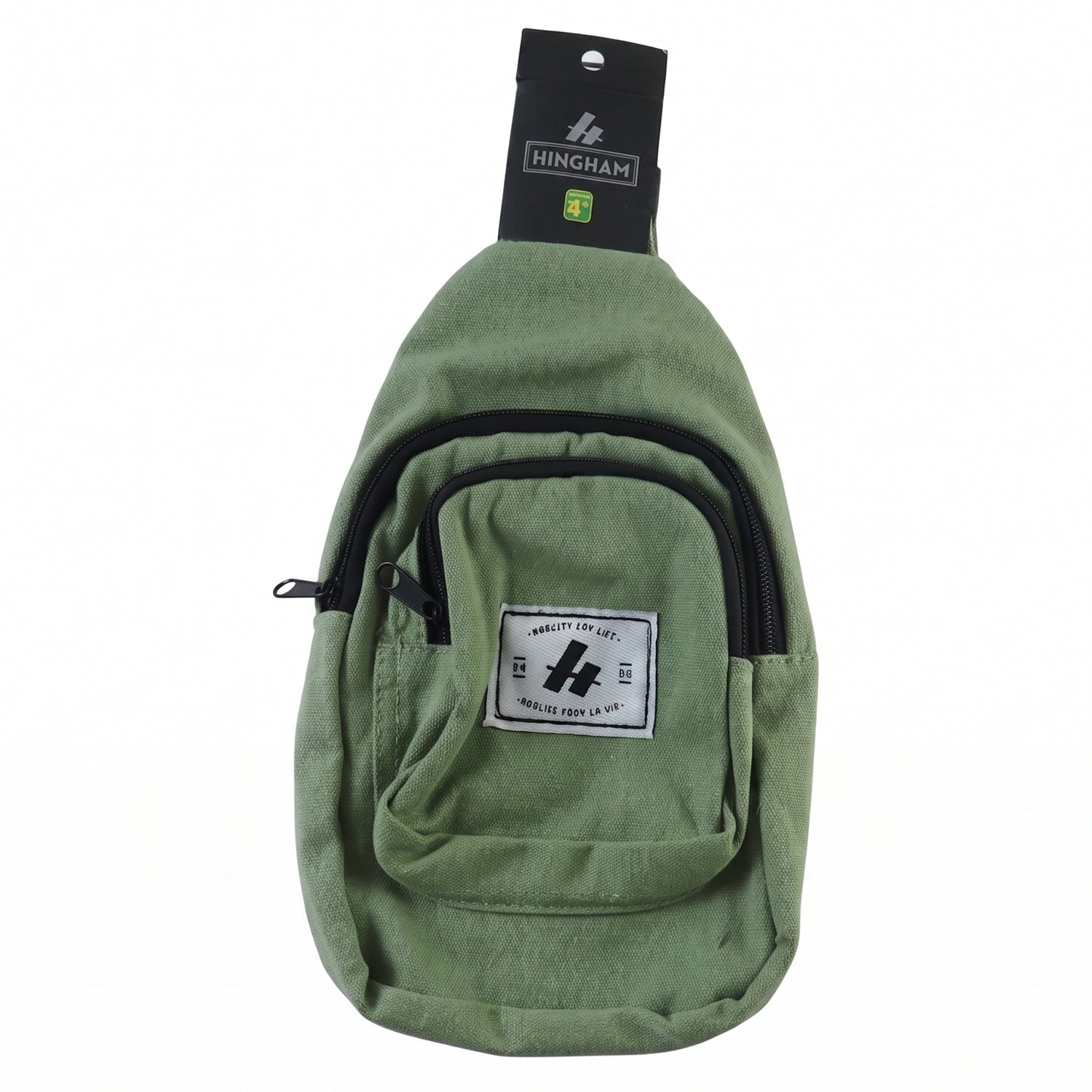 A green canvas sling bag with a front pocket and a black strap is displayed against a white background.