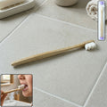 Wooden handle tooth cleaning brush