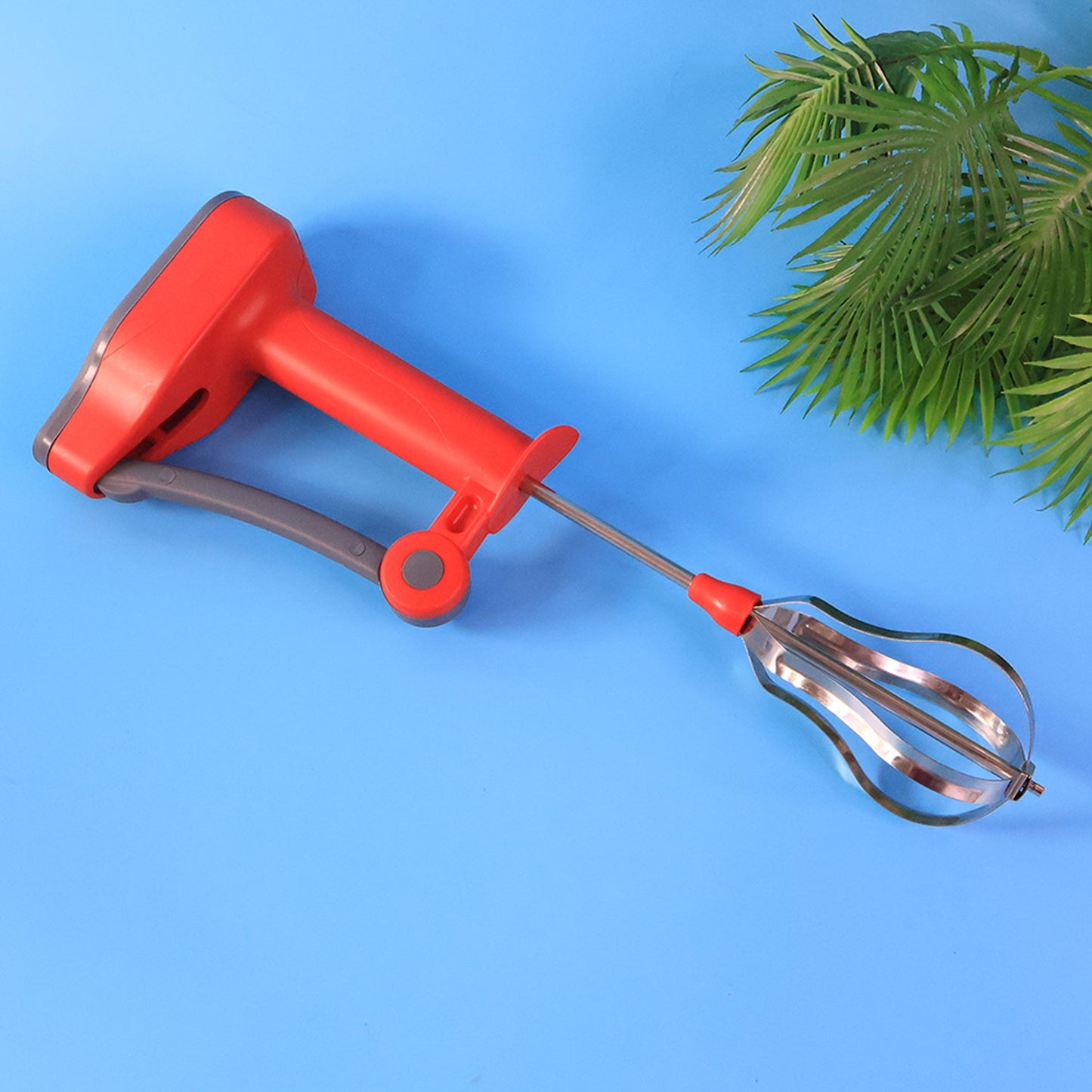 Closeup view of stainless steel whisk on the handheld power blender