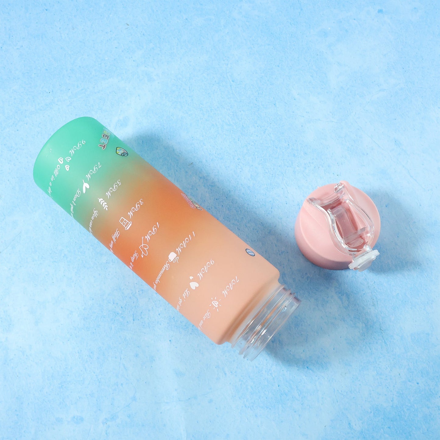 Leakproof motivational water bottle with flip-top cap and time markers