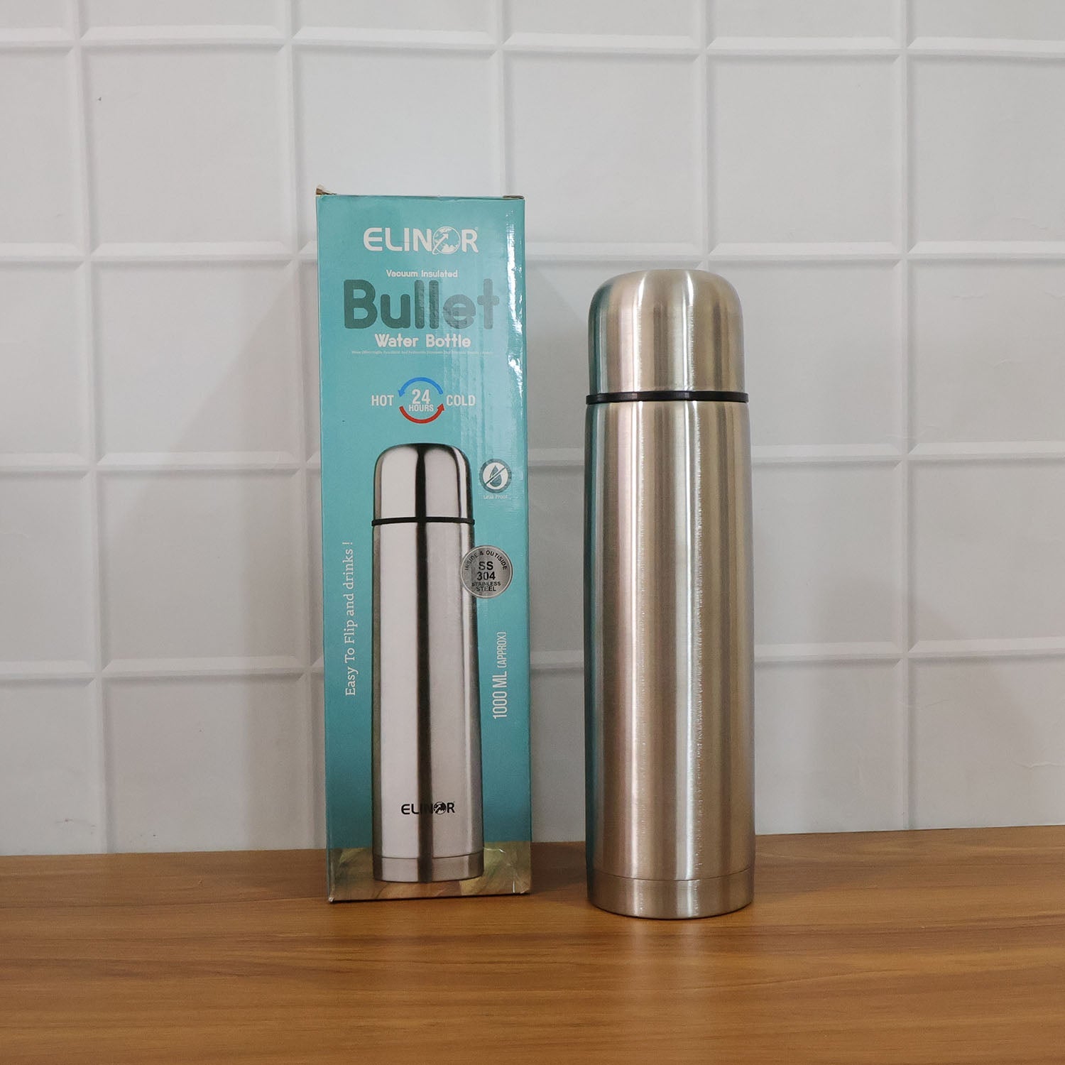Vacuum insulated water bottle in use outdoors during fitness and trekking activities