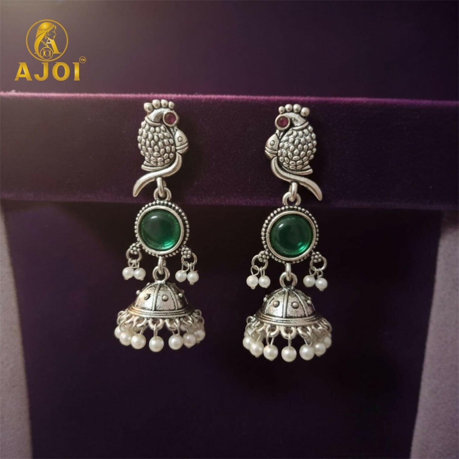 Handcrafted Antique Silver Peacock Jhumka Earrings with Emerald Green Stone & Pearl Drop Detailing