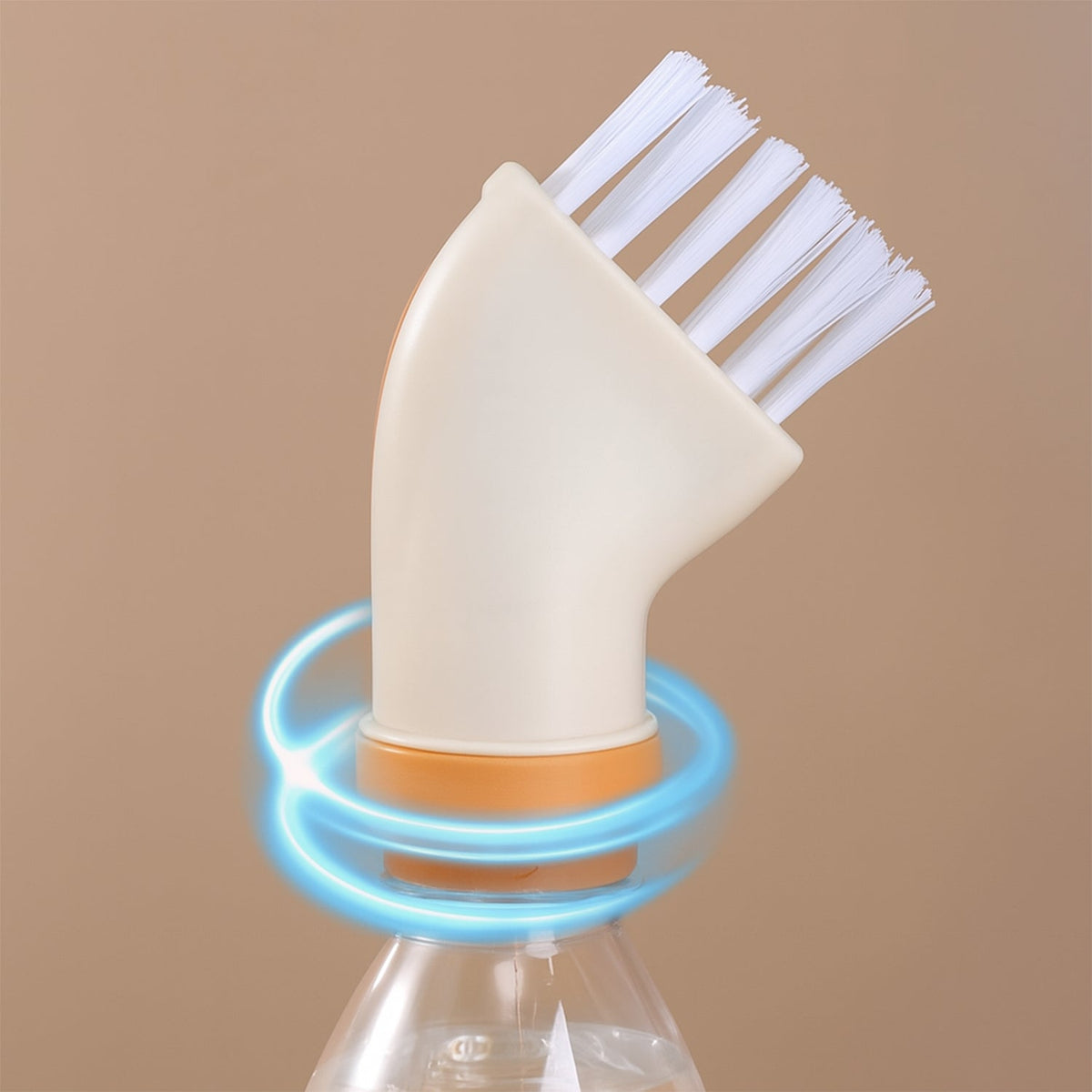 The cream and orange brush attachment is shown on a bottle, with blue glowing rings indicating a secure fit.