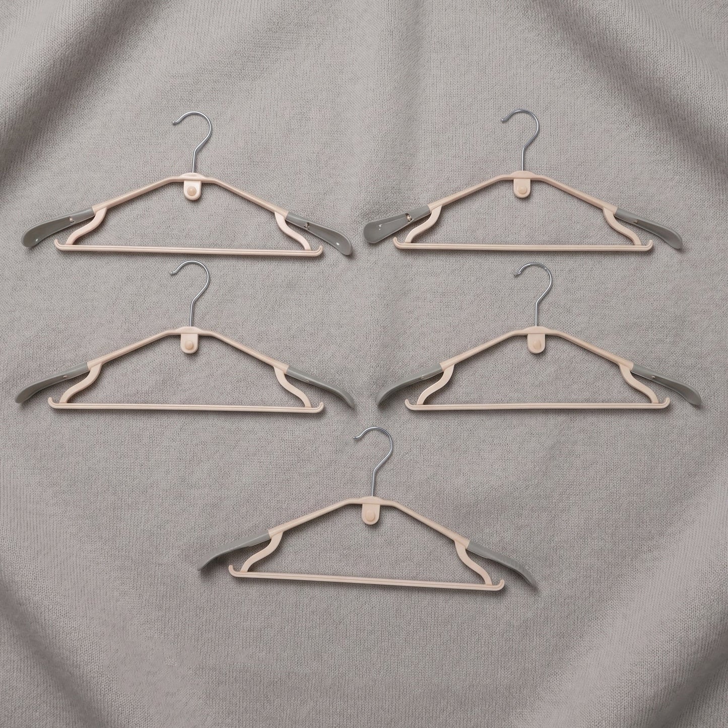 Sturdy plastic clothes hangers for daily wardrobe use