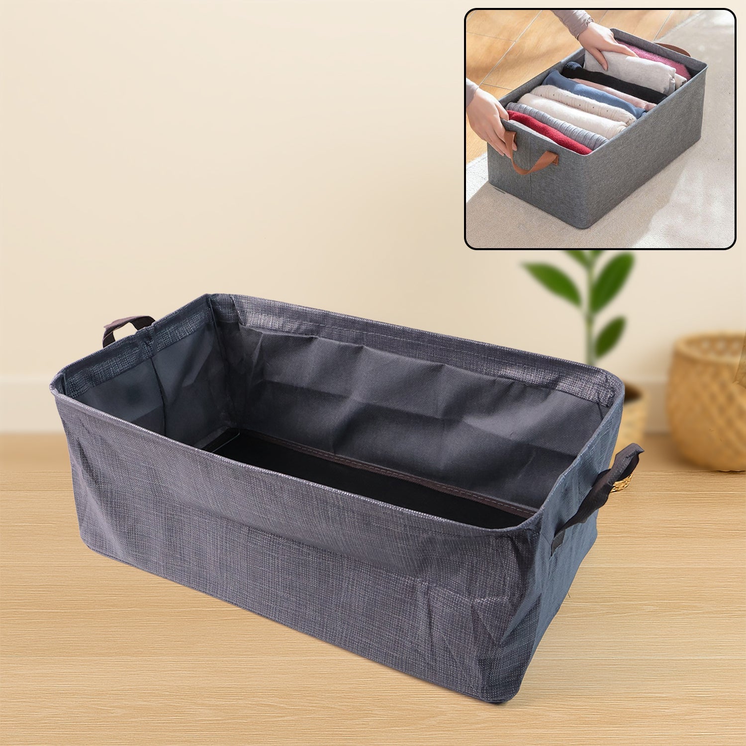 Foldable cloth storage organizer bag with handles on shelf