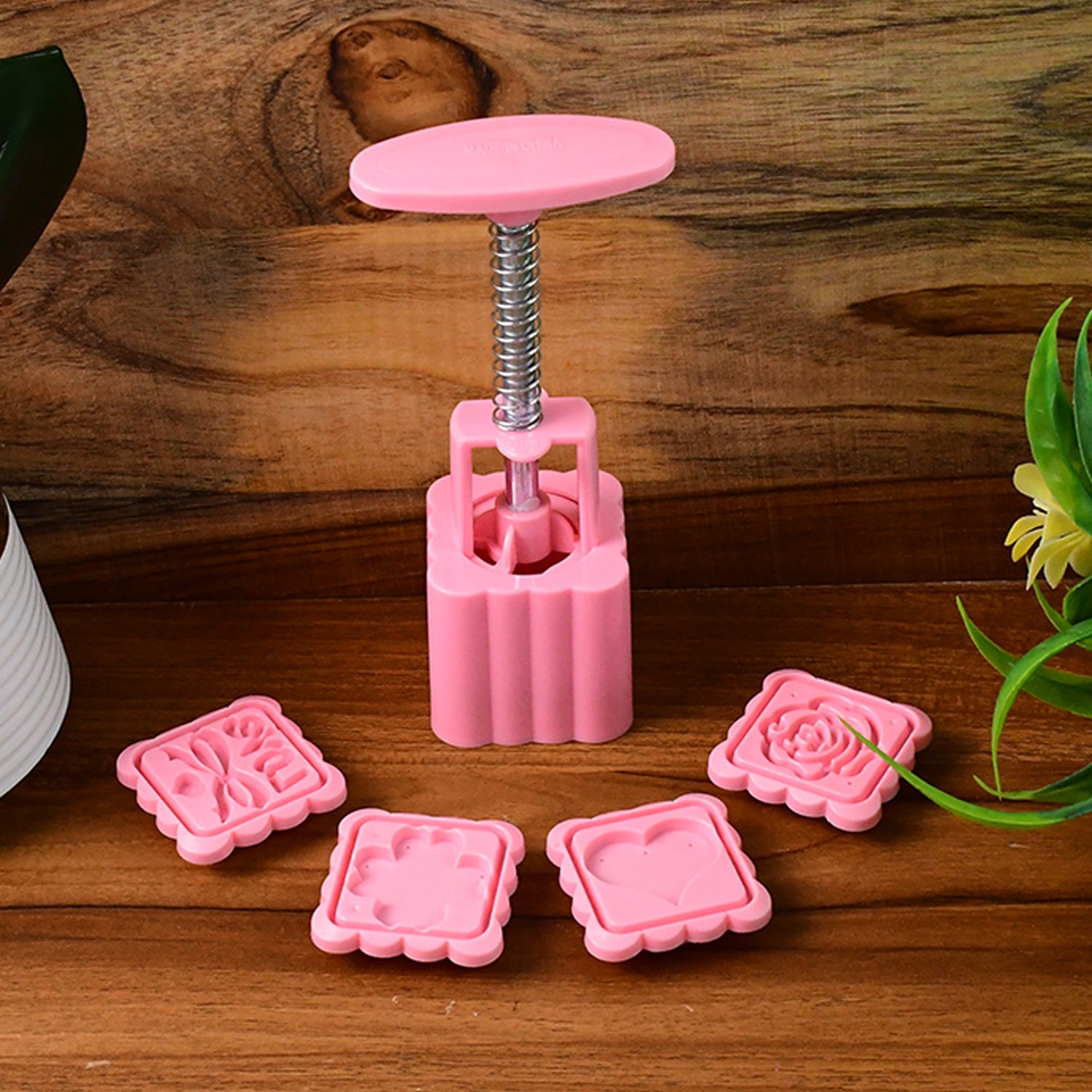 Cookie biscuit mold set with floral and heart stamps displayed
