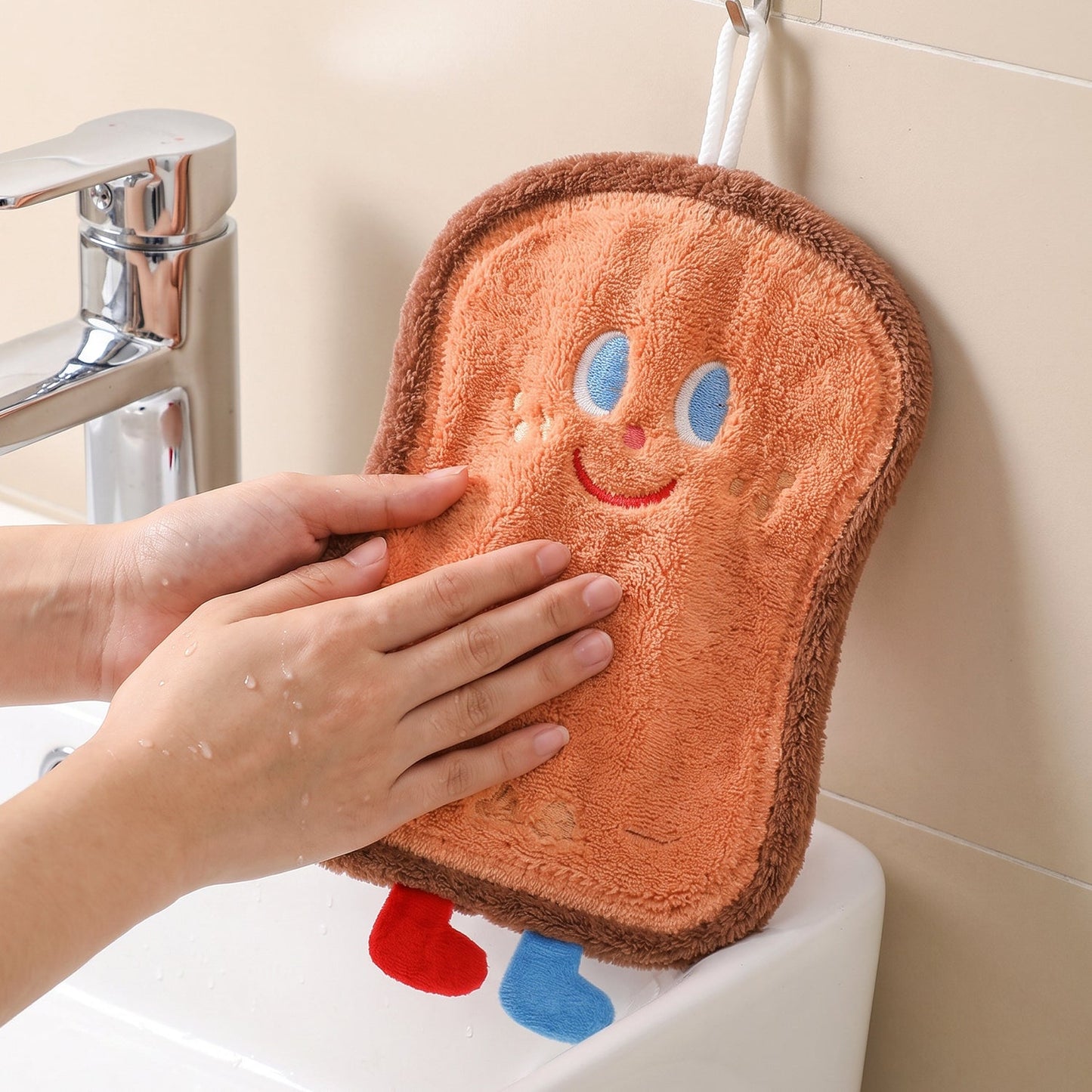 Bread slice towel hanging from a kitchen rail