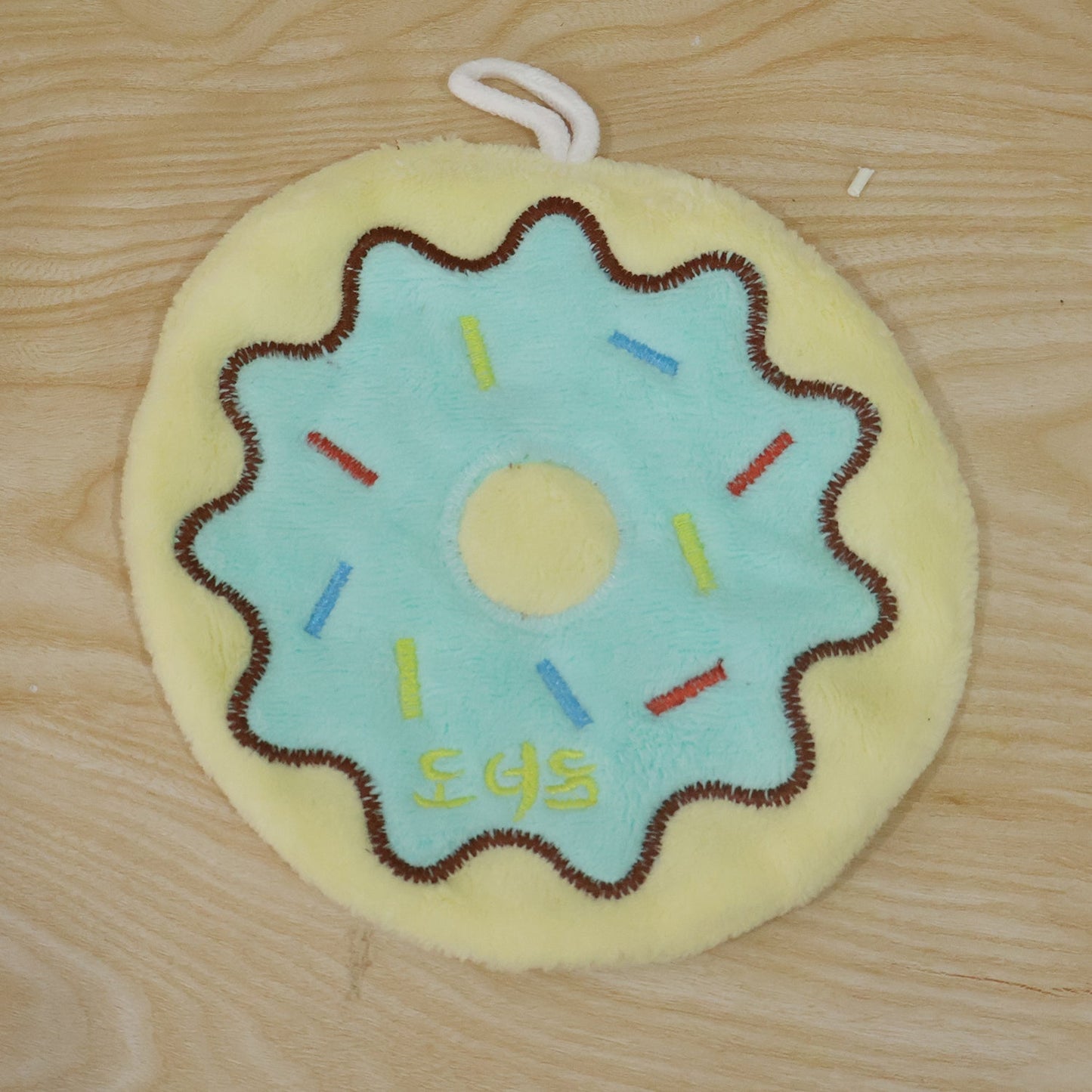 Live photo of cartoon donut hanging hand towel