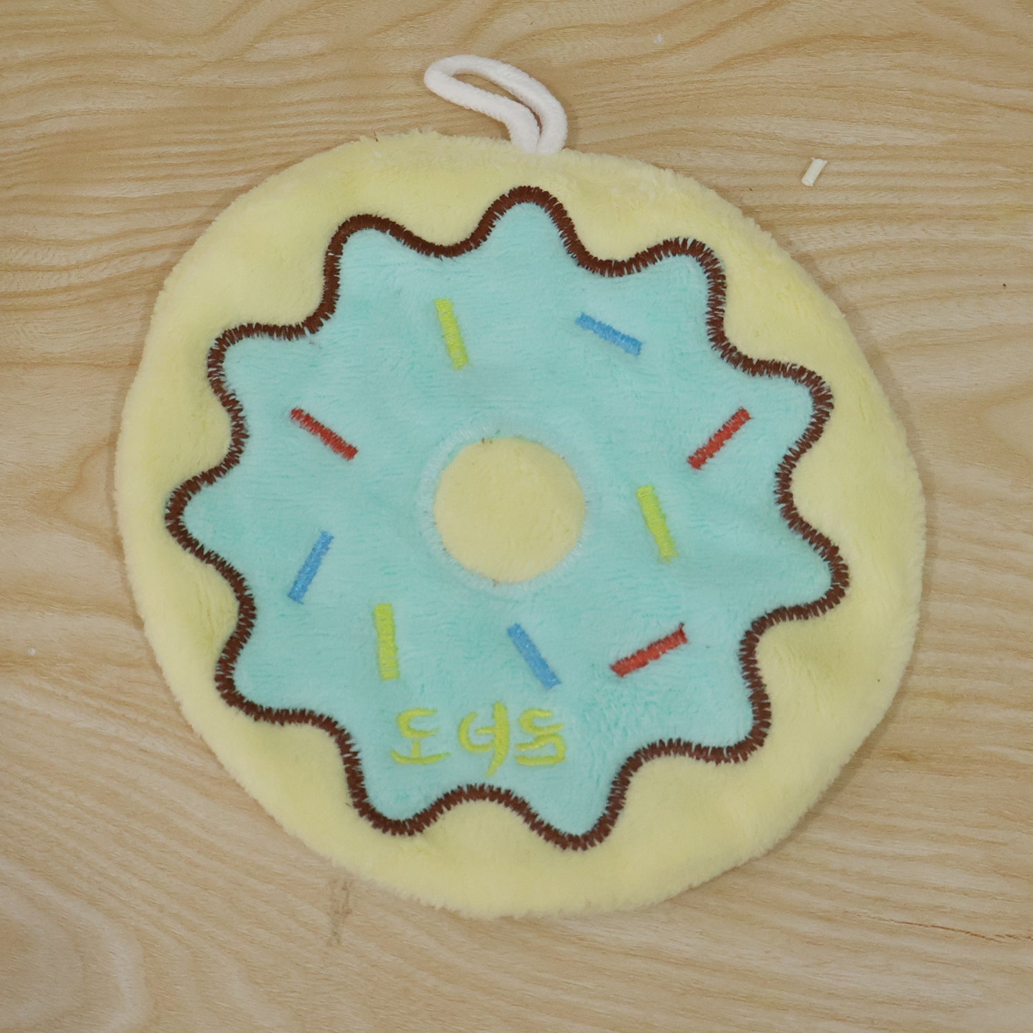 Live photo of cartoon donut hanging hand towel