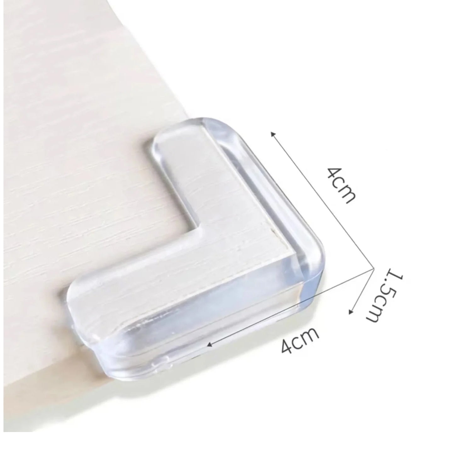 A clear silicone corner protector is shown with dimensions of 4cm by 4cm by 1.5cm indicated by arrows and text.