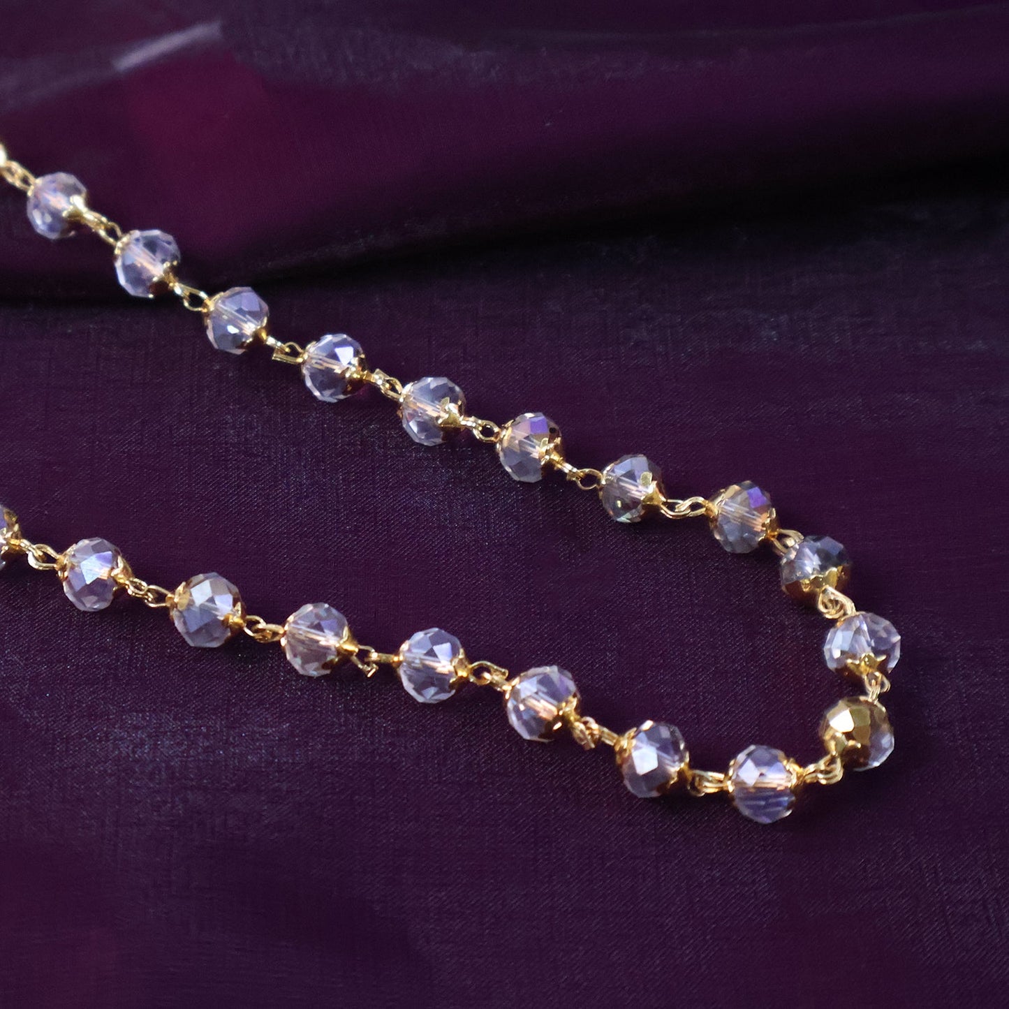 Elegant gold crystal necklace with faceted beads